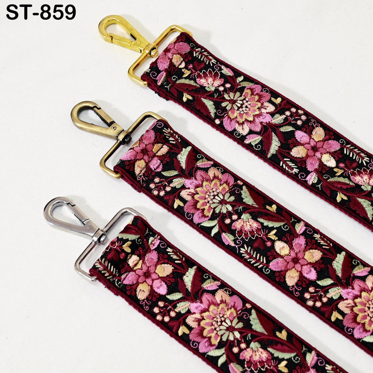 three straps with floral embroidery in red, pink, and gold colors. The straps have metal hooks and buckles, and the image is labeled with the text "ST-859".