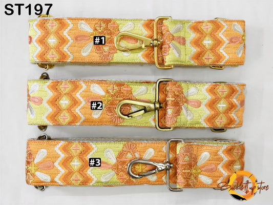 three colorful straps with different patterns, arranged in a row.
