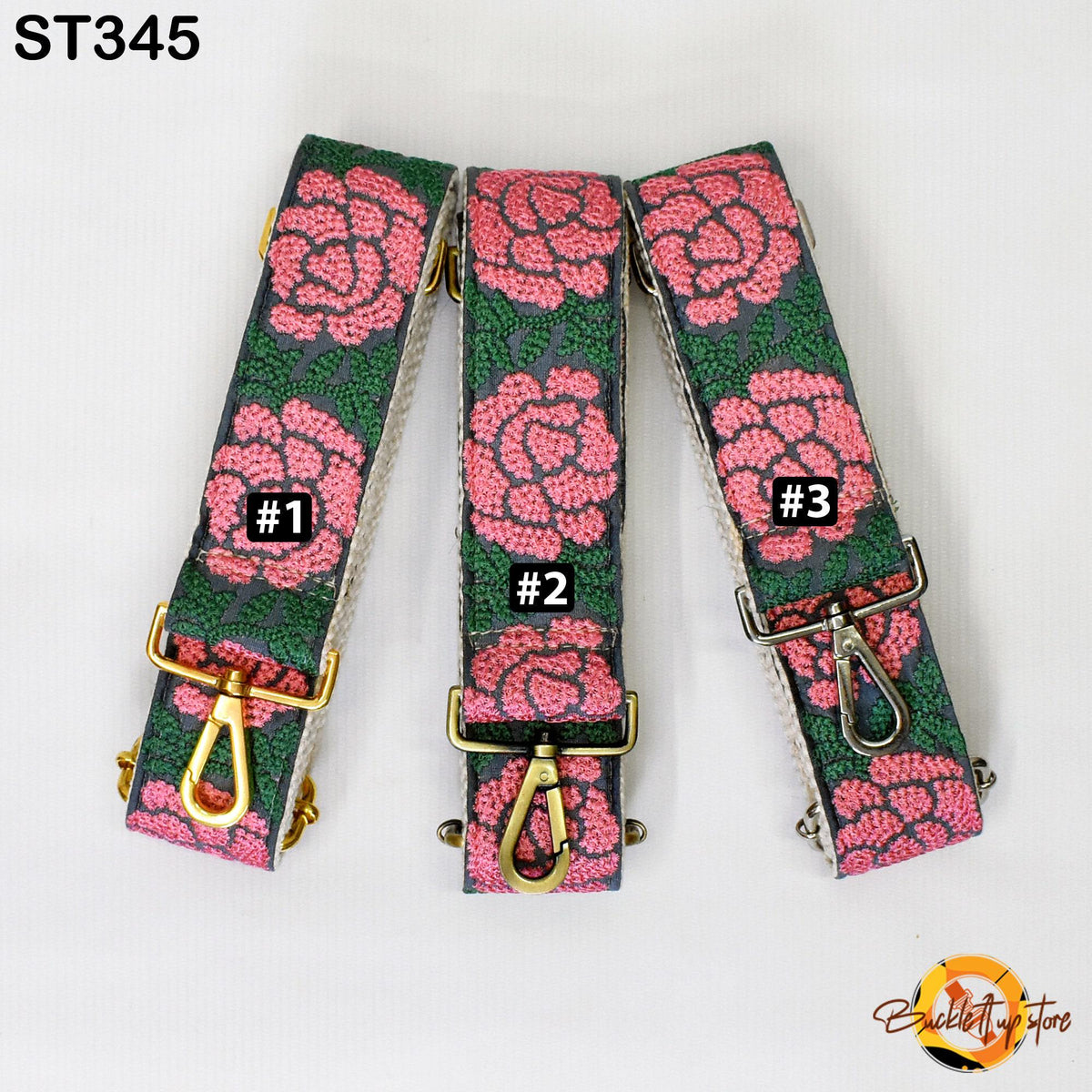 Three colorful straps with floral patterns, each with a different number printed on it.
