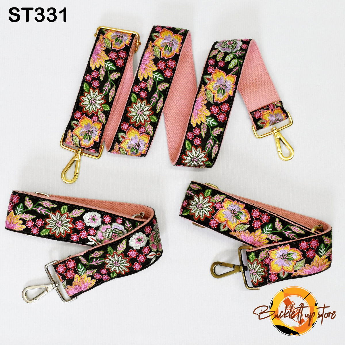 a collection of colorful floral-patterned straps, including a pink strap with a floral design and a black strap with a similar floral pattern. The straps appear to be made of fabric and are attached to metal hooks, suggesting they are intended for use as handbags or other accessories.