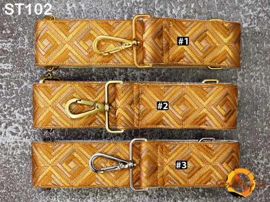 three different straps with a geometric pattern, each with a unique number printed on it.