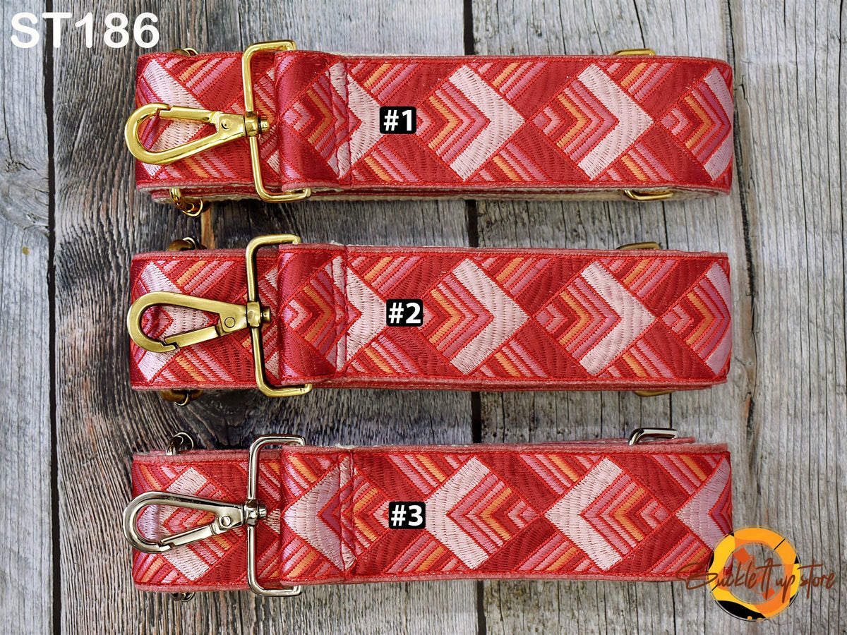 Three red and gold patterned straps are arranged on a wooden surface, with the number 1, 2, and 3 printed on them.