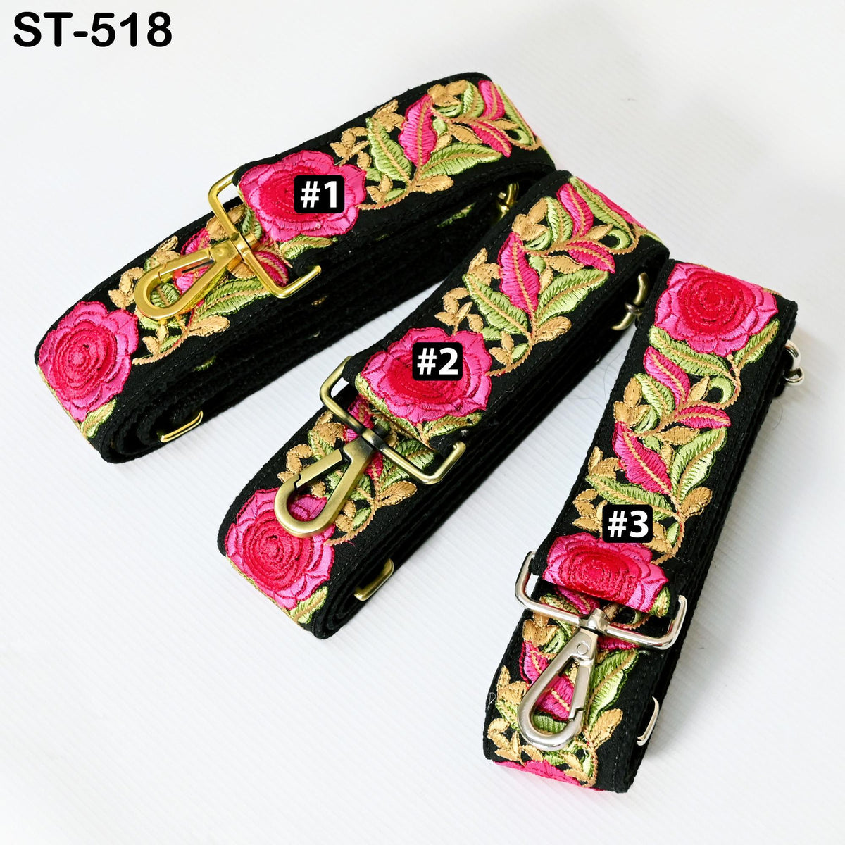 three colorful straps with floral embroidery, each with a unique number printed on it.